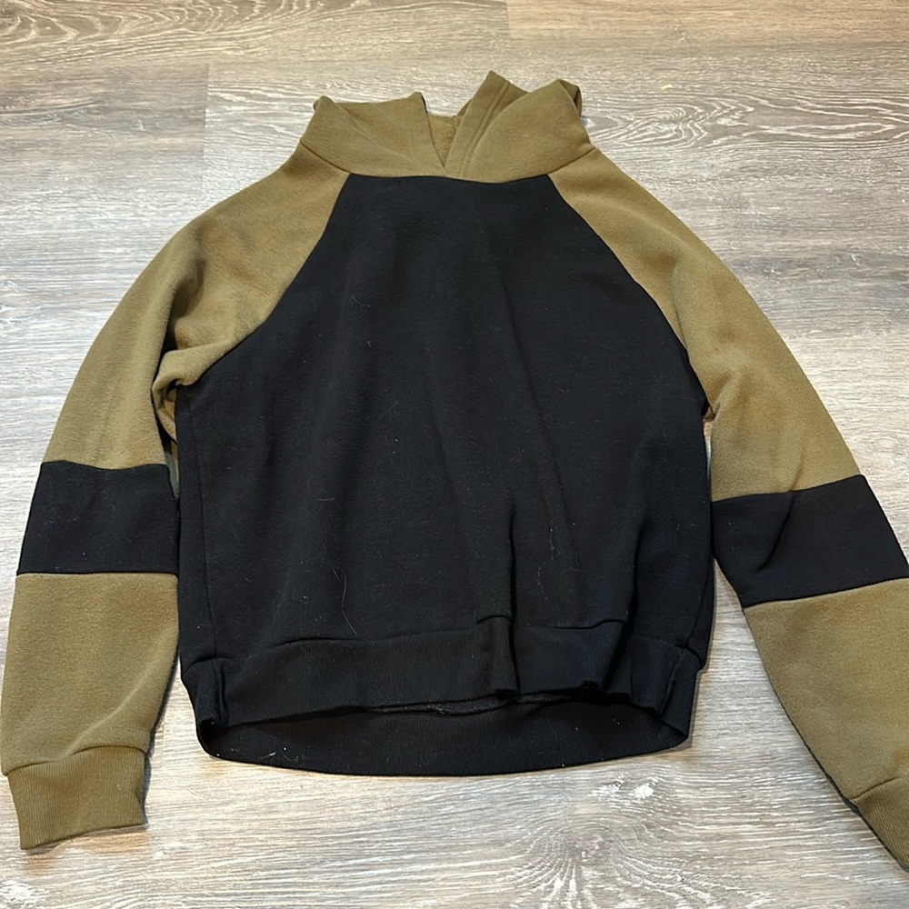 Black and green hoodie.